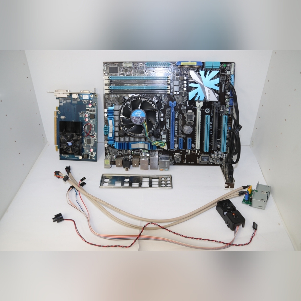ASUS Blue & Black Motherboard with CPU Cooler and Accessories. Untested